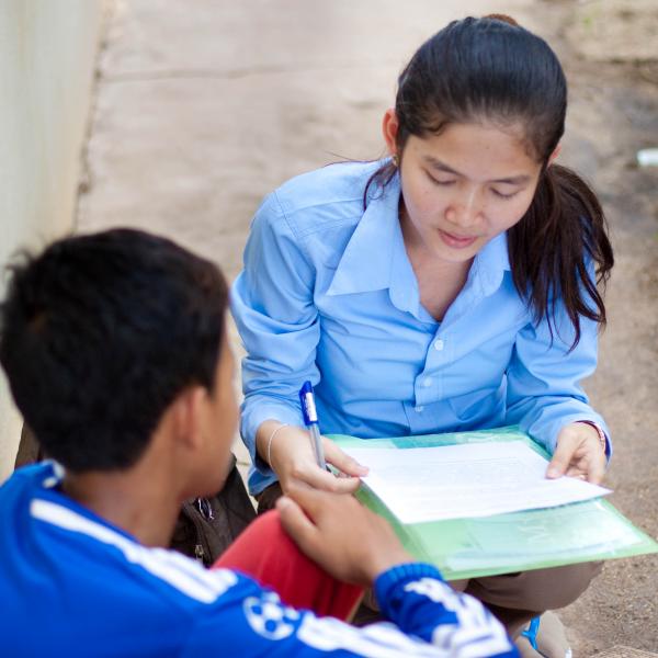 Public health worker conducts a survey 