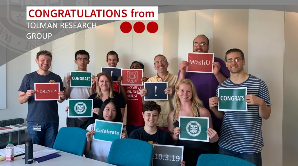 The Tolman group welcomes Chancellor Martin with celebratory banners. 