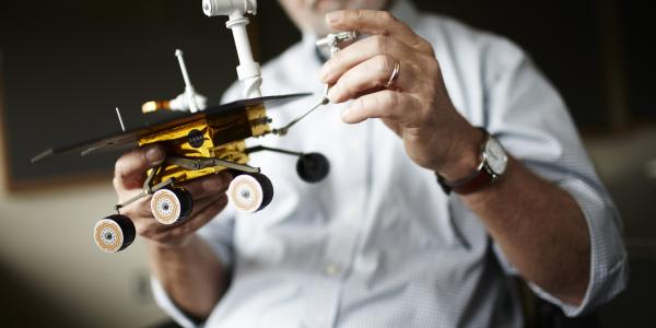 Ray Arvidson with model of Mars Rover