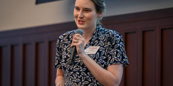 A presenter speaks at the inaugural pitch competition.