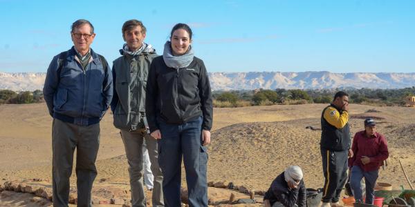 Group of people standing at in the desert