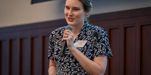 A presenter speaks at the inaugural pitch competition.