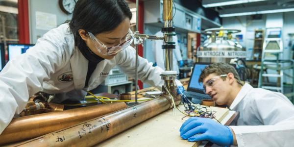 Two chemistry students working together in the Barnes Lab at WashU