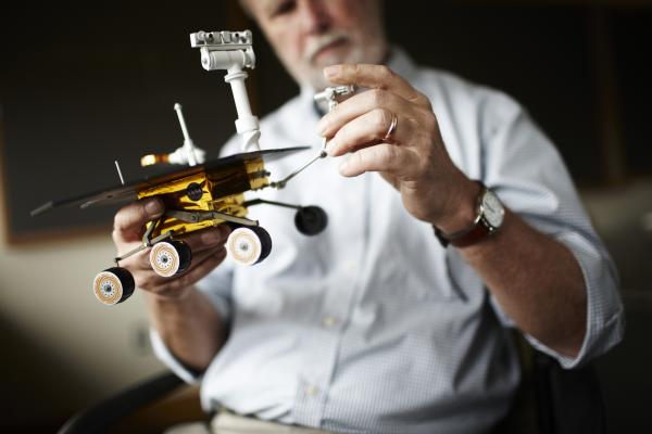 Ray Arvidson with model of Mars Rover